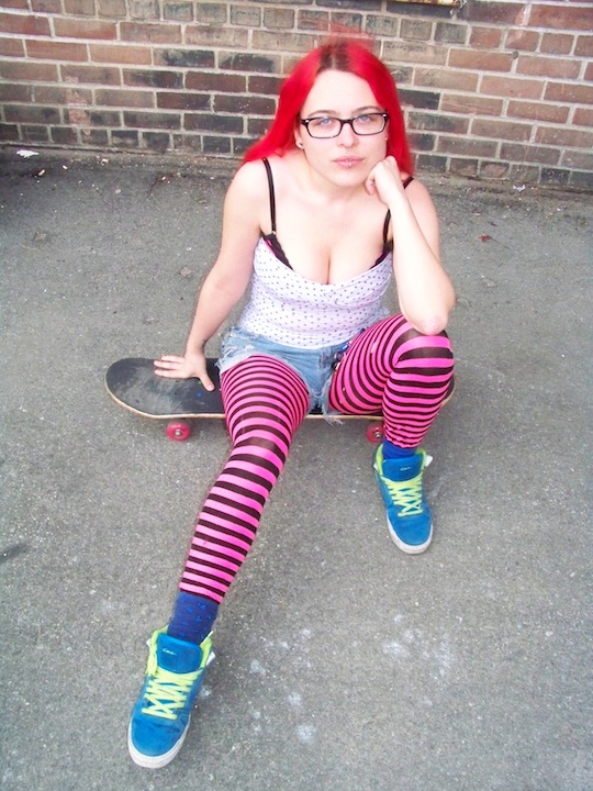 clementine-cannibal-sitting-on-skateboard